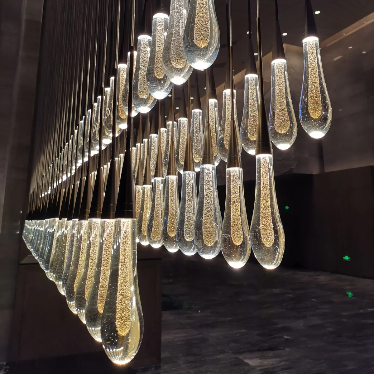 Cascading Raindrop Linear LED Chandelier – Textured Glass Orbs, Adjustable Height, Vaulted Ceiling Ready – 37 to 120 Inch Options for