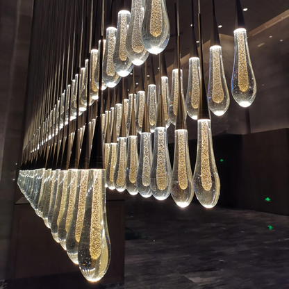 Cascading Raindrop Linear LED Chandelier – Textured Glass Orbs, Adjustable Height, Vaulted Ceiling Ready – 37 to 120 Inch Options for