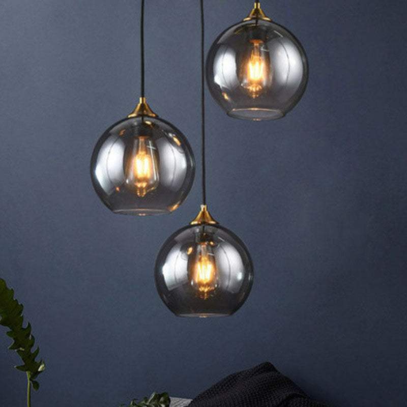 Three-Light Hanging Ceiling Fixture with Tapered Glass Globes in Antique Brass Finish for Dining Room Kitchen Island