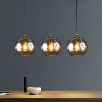 Three-Light Hanging Ceiling Fixture with Tapered Glass Globes in Antique Brass Finish for Dining Room Kitchen Island