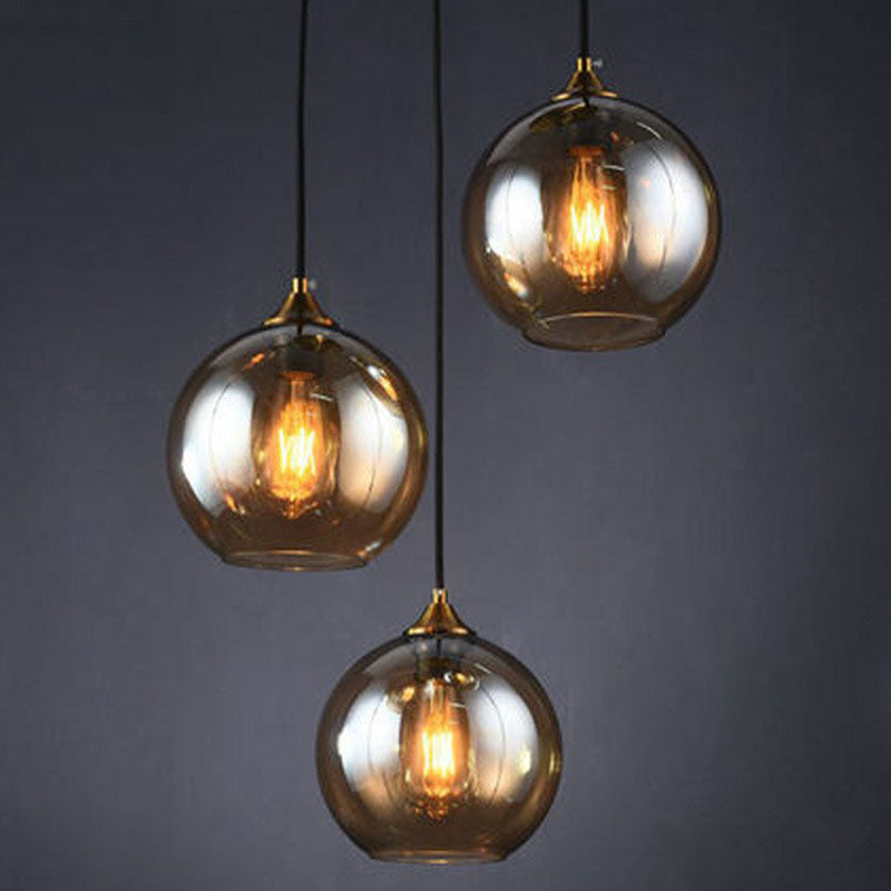 Three-Light Hanging Ceiling Fixture with Tapered Glass Globes in Antique Brass Finish for Dining Room Kitchen Island