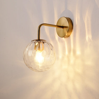 Contemporary Textured Globe Wall Light with Brass Arm | Single-Bulb Sconce for Bedroom, Hallway & Living Room | Hardwired Electric Fixture