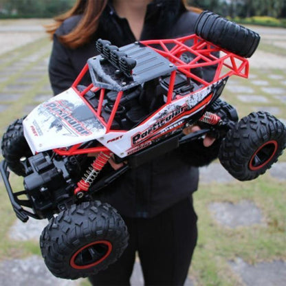 1:12 Scale Hobby-Grade Climbing Truck with 2.4GHz Radio & Shock-Absorbing Suspension for Dirt, Rocks, Grass