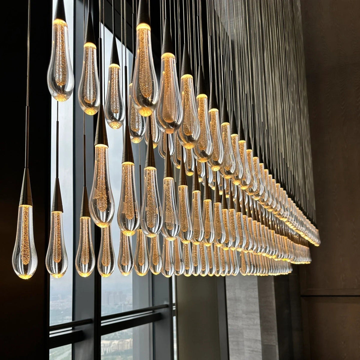 Cascading Raindrop Linear LED Chandelier – Textured Glass Orbs, Adjustable Height, Vaulted Ceiling Ready – 37 to 120 Inch Options for