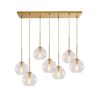 Seven-Globe Hanging Light with Adjustable Height Cords for Kitchen Island & Dining Table, Clear Glass Spheres, 35-Inch Canopy, E26 Base, Dim