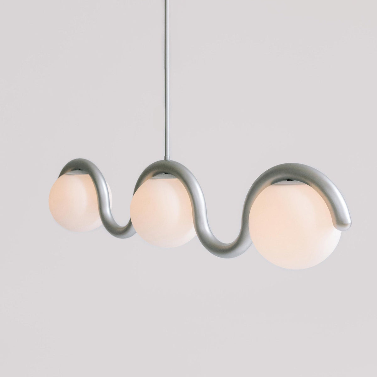 Modern Linear Chandelier with Curved Metal Frame & Glass Sphere – Art Nouveau Pendant Light for Dining Room