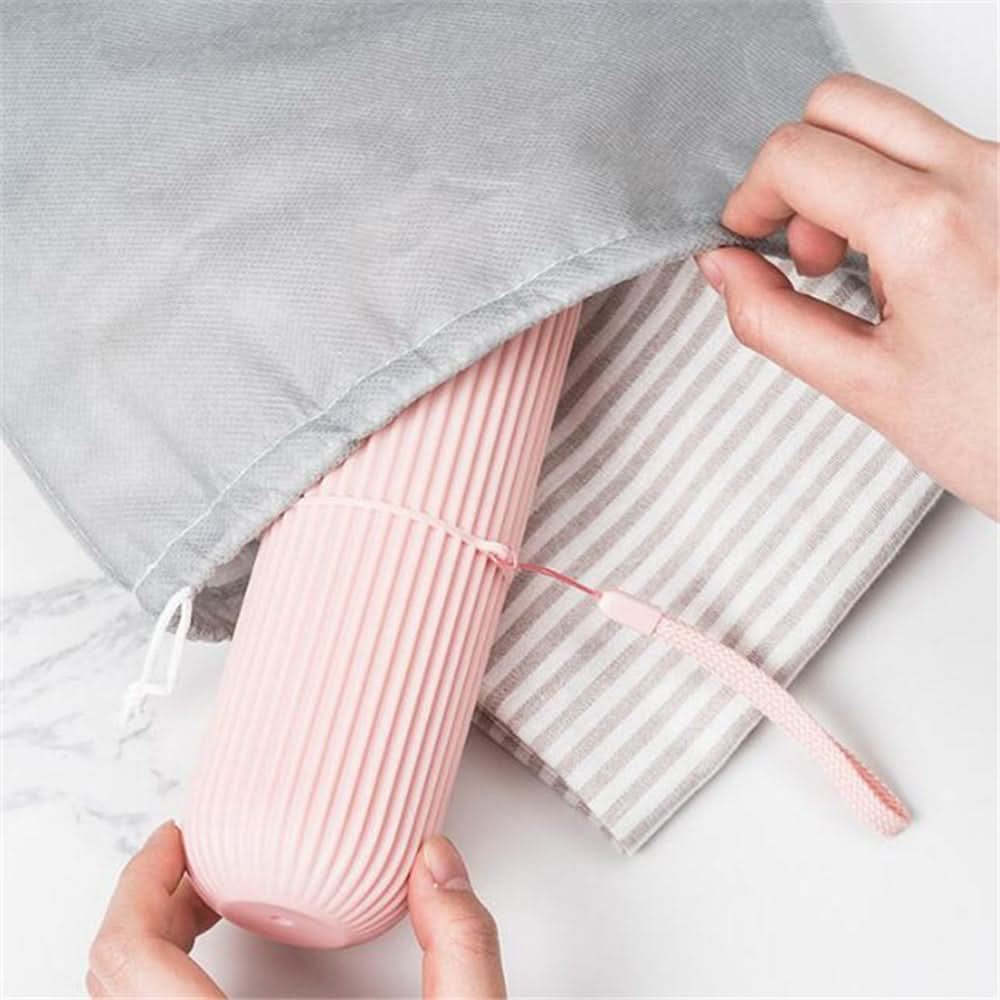 TRAVEL CUP – Portable toothbrush and toothpaste storage case designed for hygienic and compact travel organization
