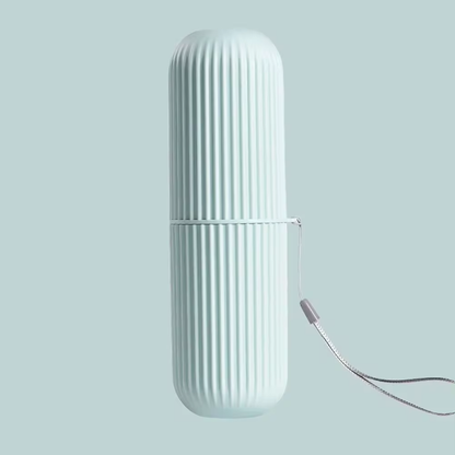 TRAVEL CUP – Portable toothbrush and toothpaste storage case designed for hygienic and compact travel organization