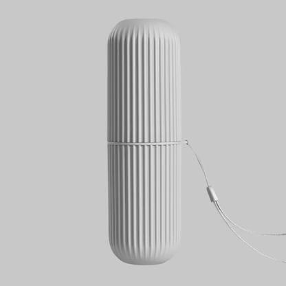 TRAVEL CUP – Portable toothbrush and toothpaste storage case designed for hygienic and compact travel organization