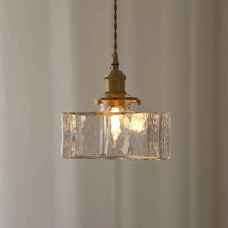Ribbed Glass Globe Hanging Light Fixture with Brass Accents for Dining Areas and Entryways