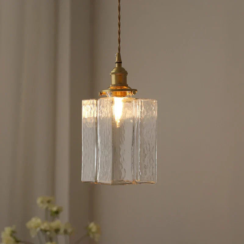 Ribbed Glass Globe Hanging Light Fixture with Brass Accents for Dining Areas and Entryways