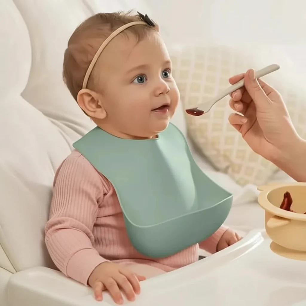 SILIBIB – Soft silicone baby bib with adjustable fit for mess-free feeding comfort