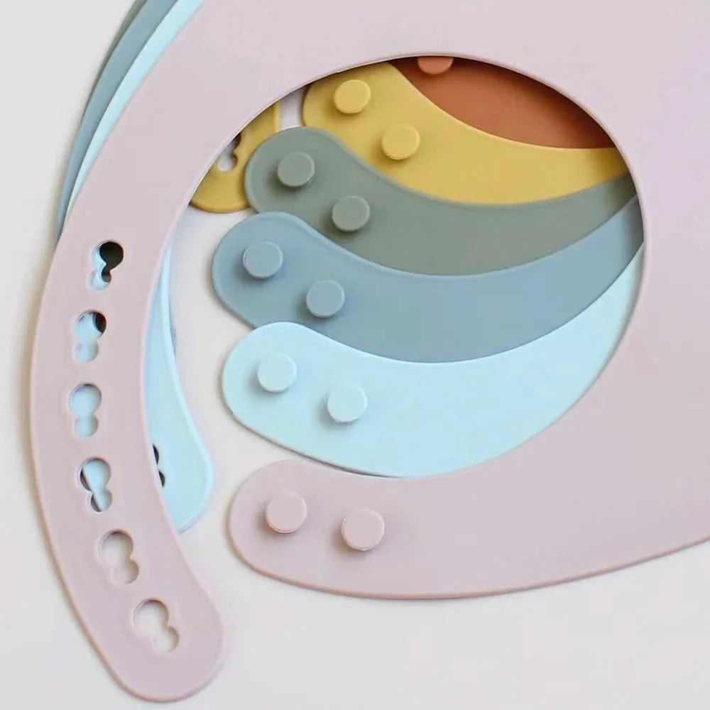 SILIBIB – Soft silicone baby bib with adjustable fit for mess-free feeding comfort