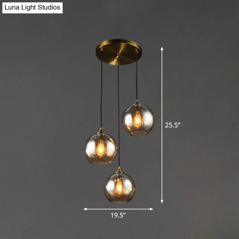 Three-Light Hanging Ceiling Fixture with Tapered Glass Globes in Antique Brass Finish for Dining Room Kitchen Island
