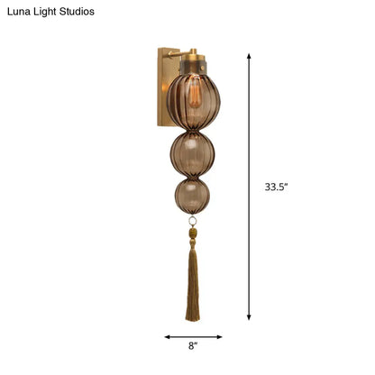 Round Glass Wall Sconce with Decorative Tassel | Asian-Inspired Globe Fixture | Chrome or Brass Finish for Living Room, Hallway, Bedroom