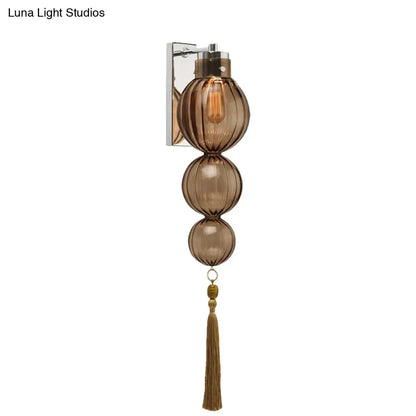 Round Glass Wall Sconce with Decorative Tassel | Asian-Inspired Globe Fixture | Chrome or Brass Finish for Living Room, Hallway, Bedroom