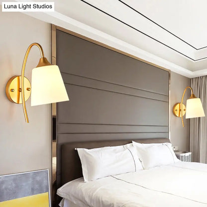 Curved Arm Wall Sconce with Tapered Glass Shade – Adjustable Brass Finish Fixture for Bedroom & Hallway