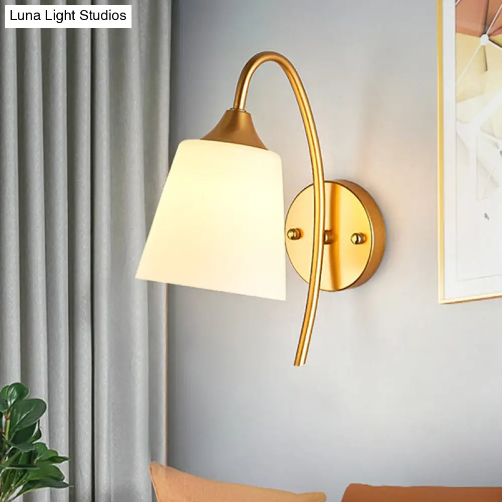 Curved Arm Wall Sconce with Tapered Glass Shade – Adjustable Brass Finish Fixture for Bedroom & Hallway
