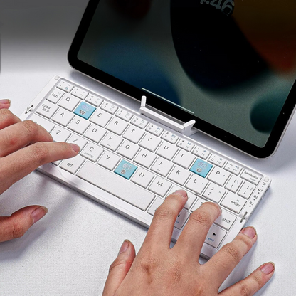 Portable Folding Wireless Keyboard with Integrated Tablet Stand for iPad Android iOS Devices Multi-Device Pairing Rechargeable Travel Typing
