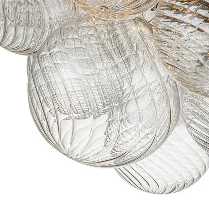 Three-Globe Ceiling Mount Fixture with Textured Glass Shades in Warm Metal Finish for Entry, Dining Room & Living Room