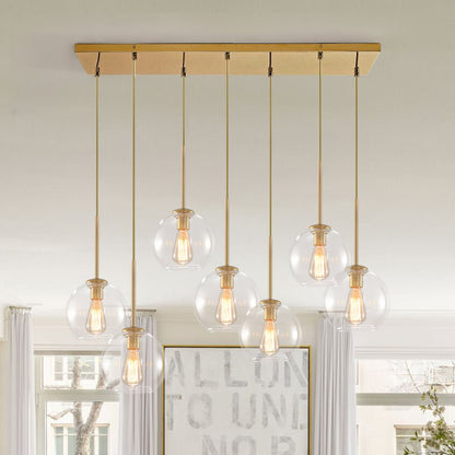 Seven-Globe Hanging Light with Adjustable Height Cords for Kitchen Island & Dining Table, Clear Glass Spheres, 35-Inch Canopy, E26 Base, Dim