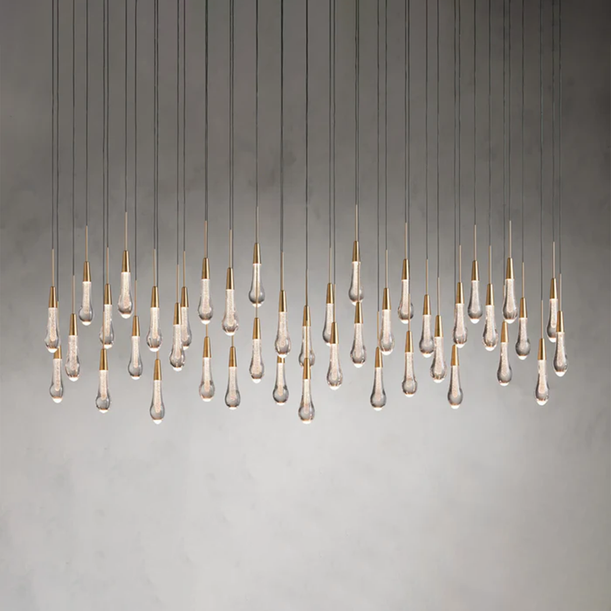 Cascading Raindrop Linear LED Chandelier – Textured Glass Orbs, Adjustable Height, Vaulted Ceiling Ready – 37 to 120 Inch Options for